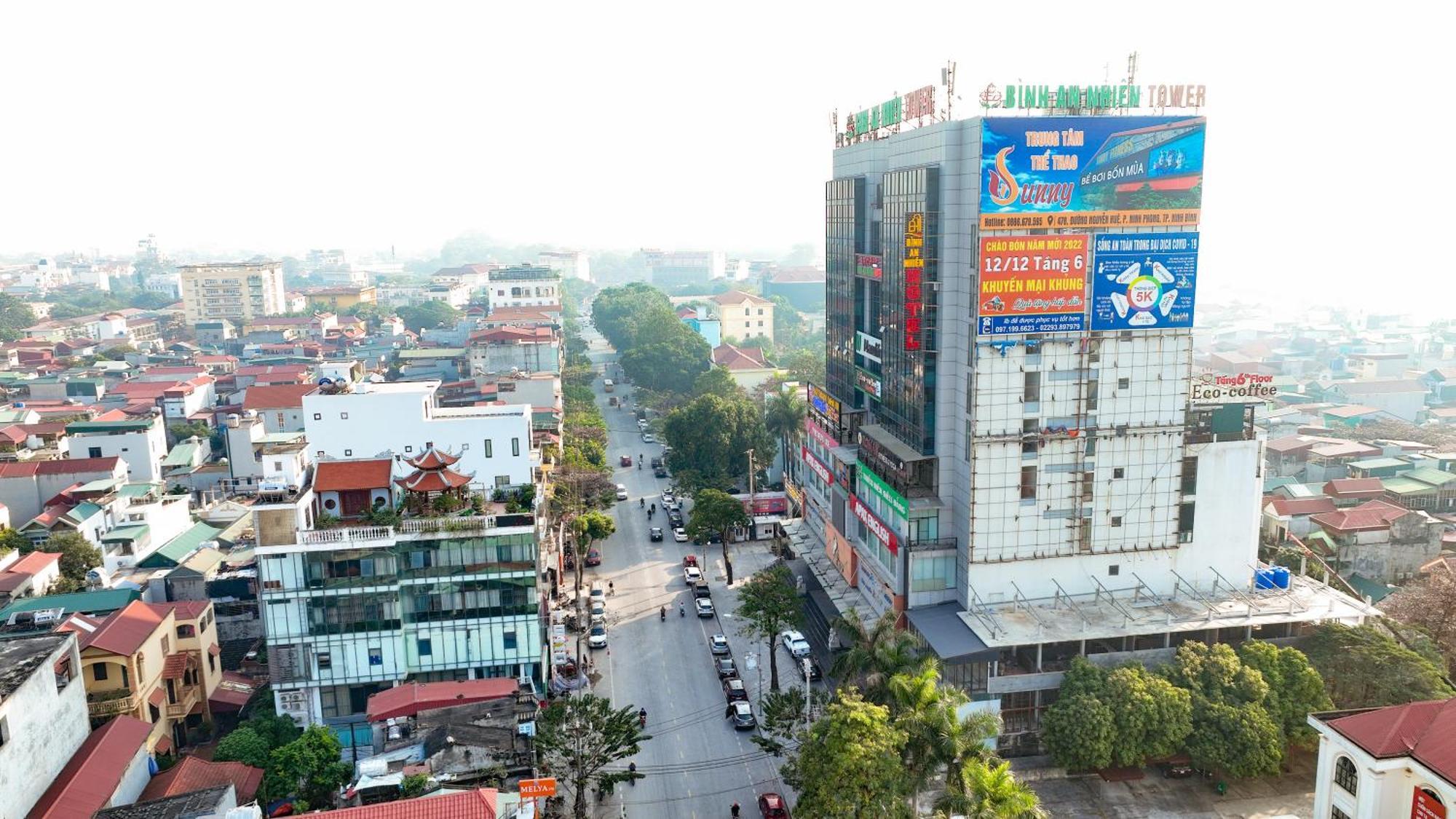 Binh An Nhien Hotel Duong Thanh Buitenkant foto